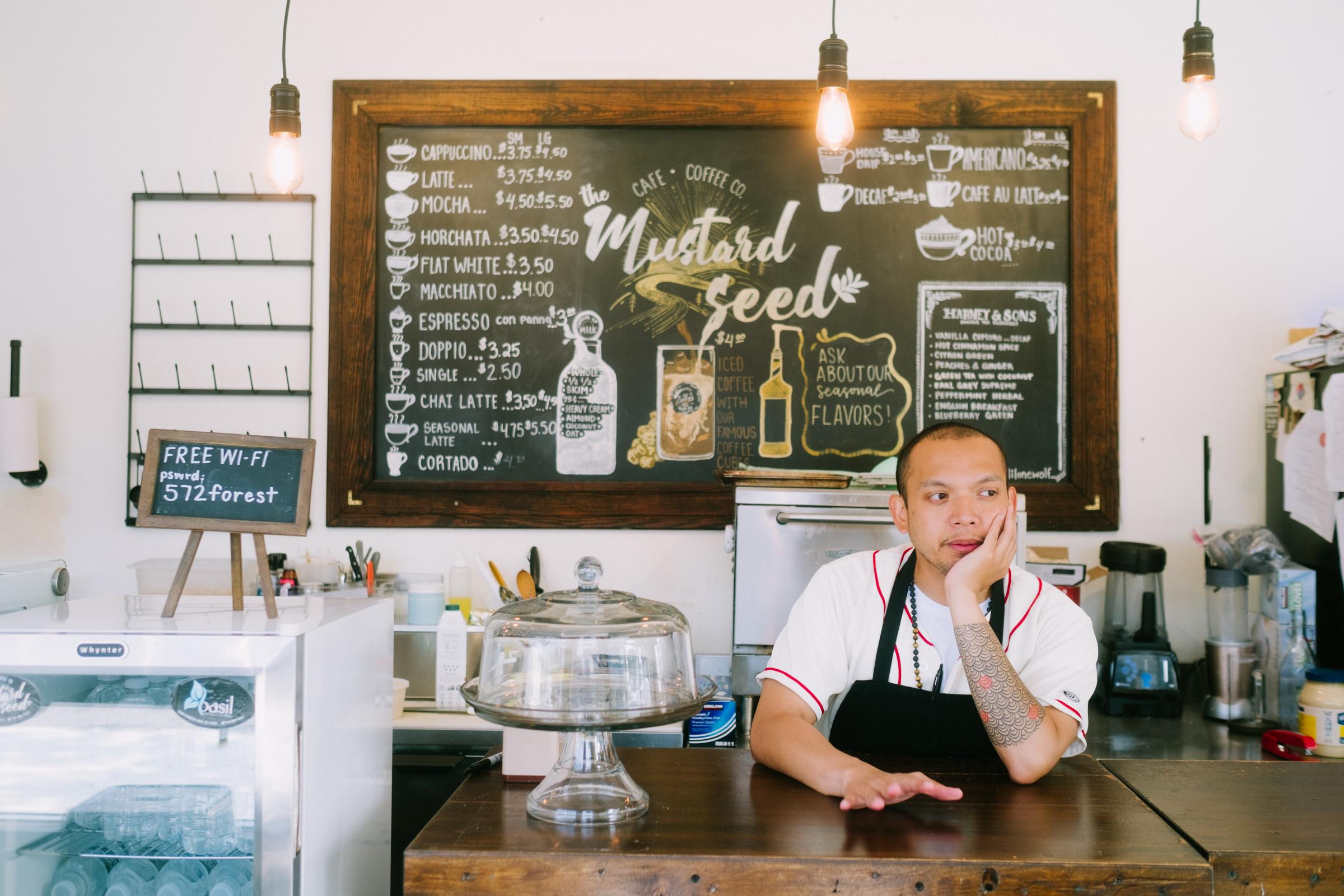 Pico behind the counter at Redemption Coffee